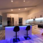LED Lighting - black and purple chairs on brown wooden floor