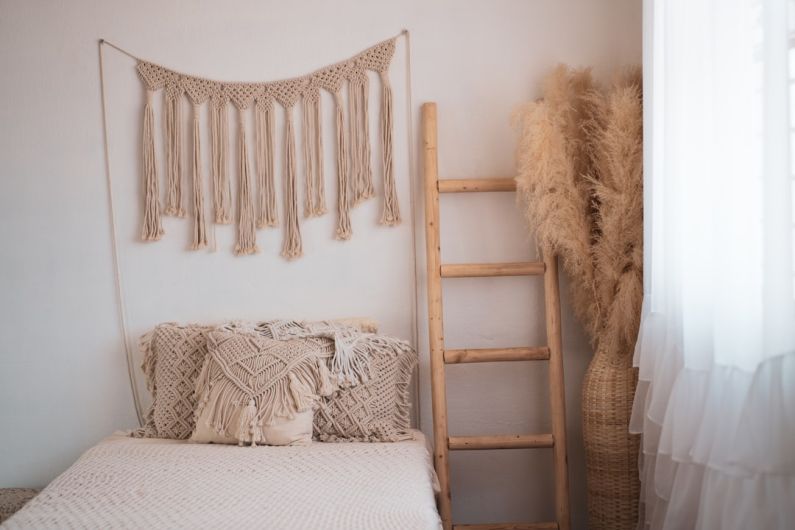 Budget Decor - a bed with a ladder and a ladder
